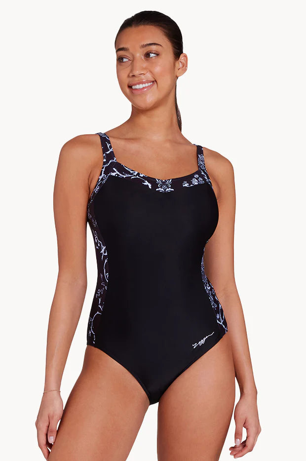 Women in Classique Ankor Clipback one piece swimwear in black with wave patterns by Zoggs with v neck and full coverage and eco sensitive fabric for B-E cup size bust front view