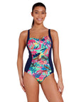 Women wearing Kuringai Ruched Front One Piece swimsuit in navy with green pink and blue floral ruched front panel for C-E cup bust size in chlorine resistant eco sensitive fabric with good coverage by swim brand Zoggs with white background front view